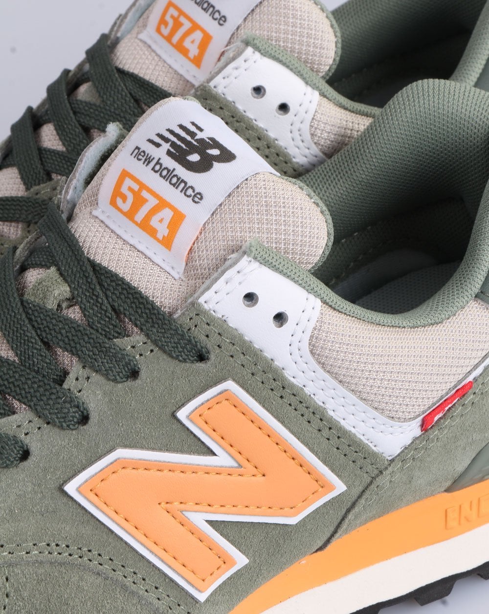 New Balance 574 Trainer Grün/Orange