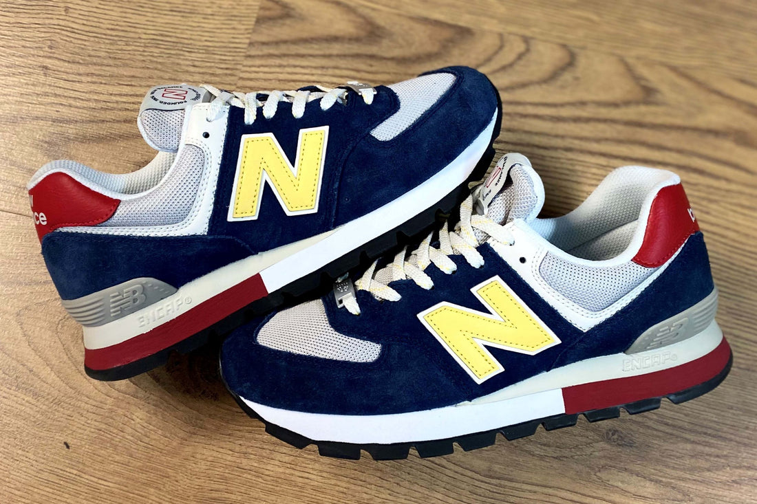 New Balance 574 Rugged Edition navy red yellow