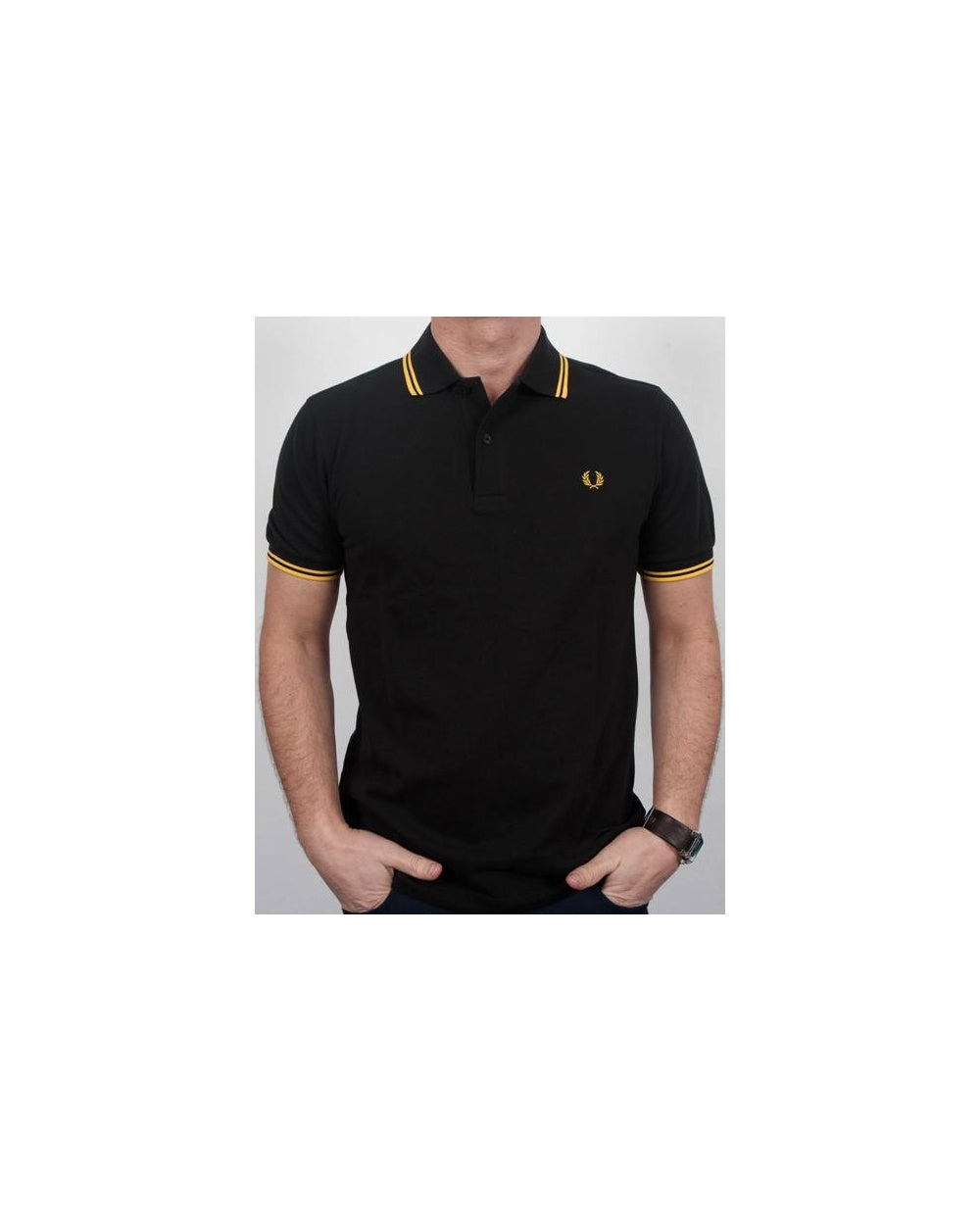 Fred Perry Poloshirt mit Doppelstreifen Schwarz/Gelb