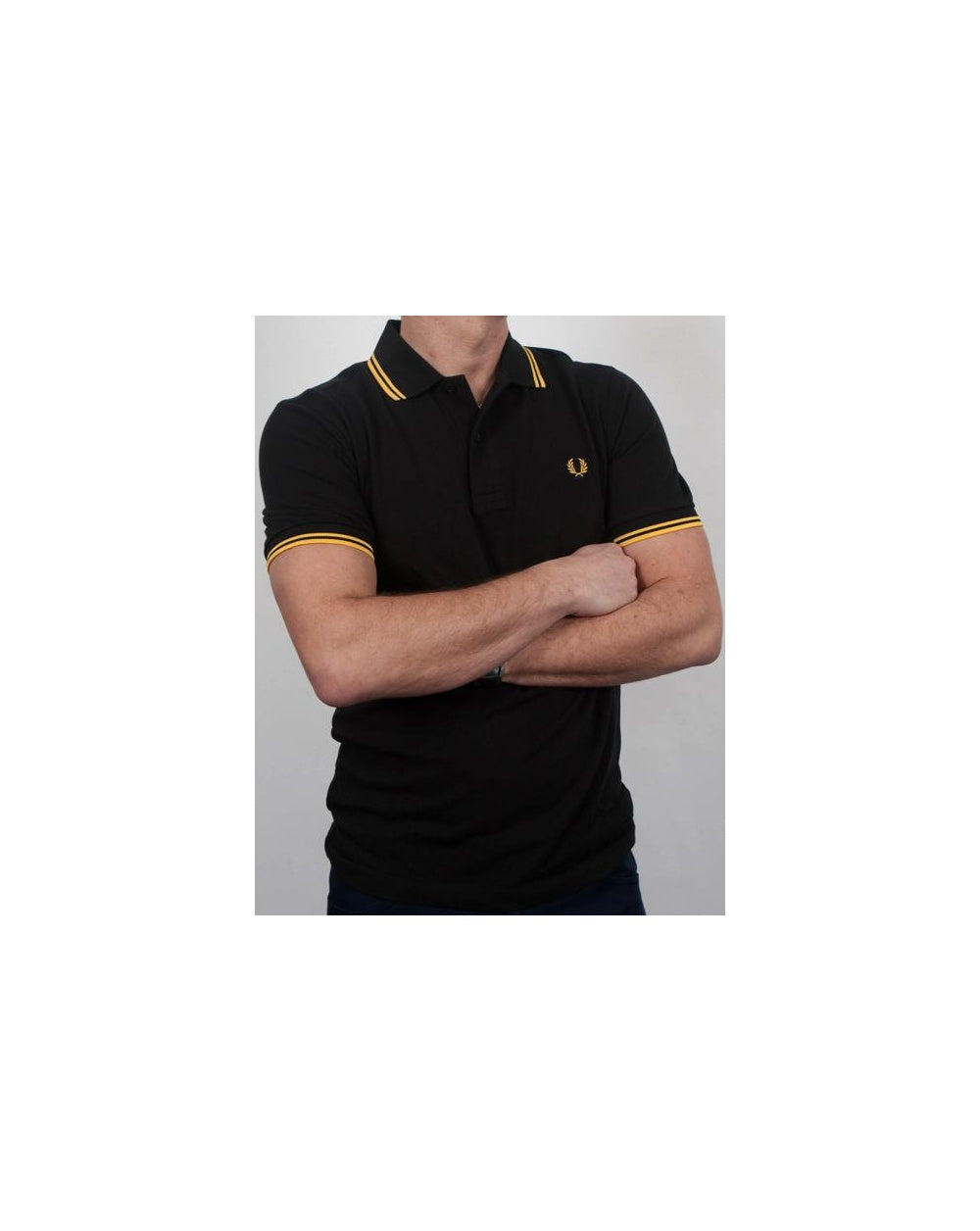 Fred Perry Poloshirt mit Doppelstreifen Schwarz/Gelb
