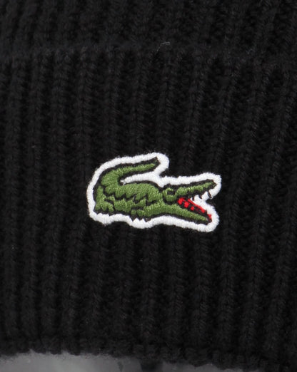 Lacoste – Gerippte Wollmütze mit Umschlag in Schwarz