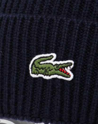 Lacoste – Gerippte Wollmütze mit Umschlag in Marineblau