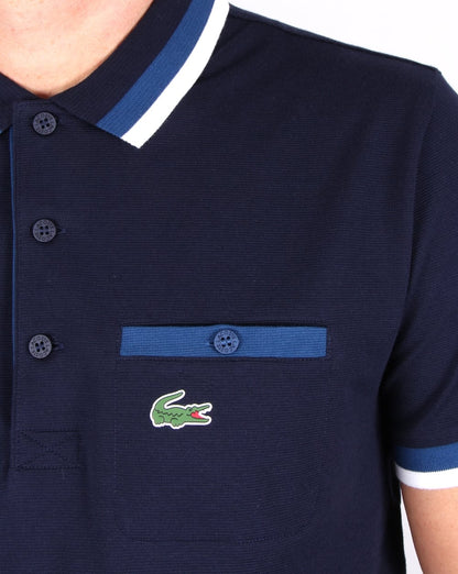 Lacoste – Poloshirt mit Taschendetail, Marineblau/Kobaltblau