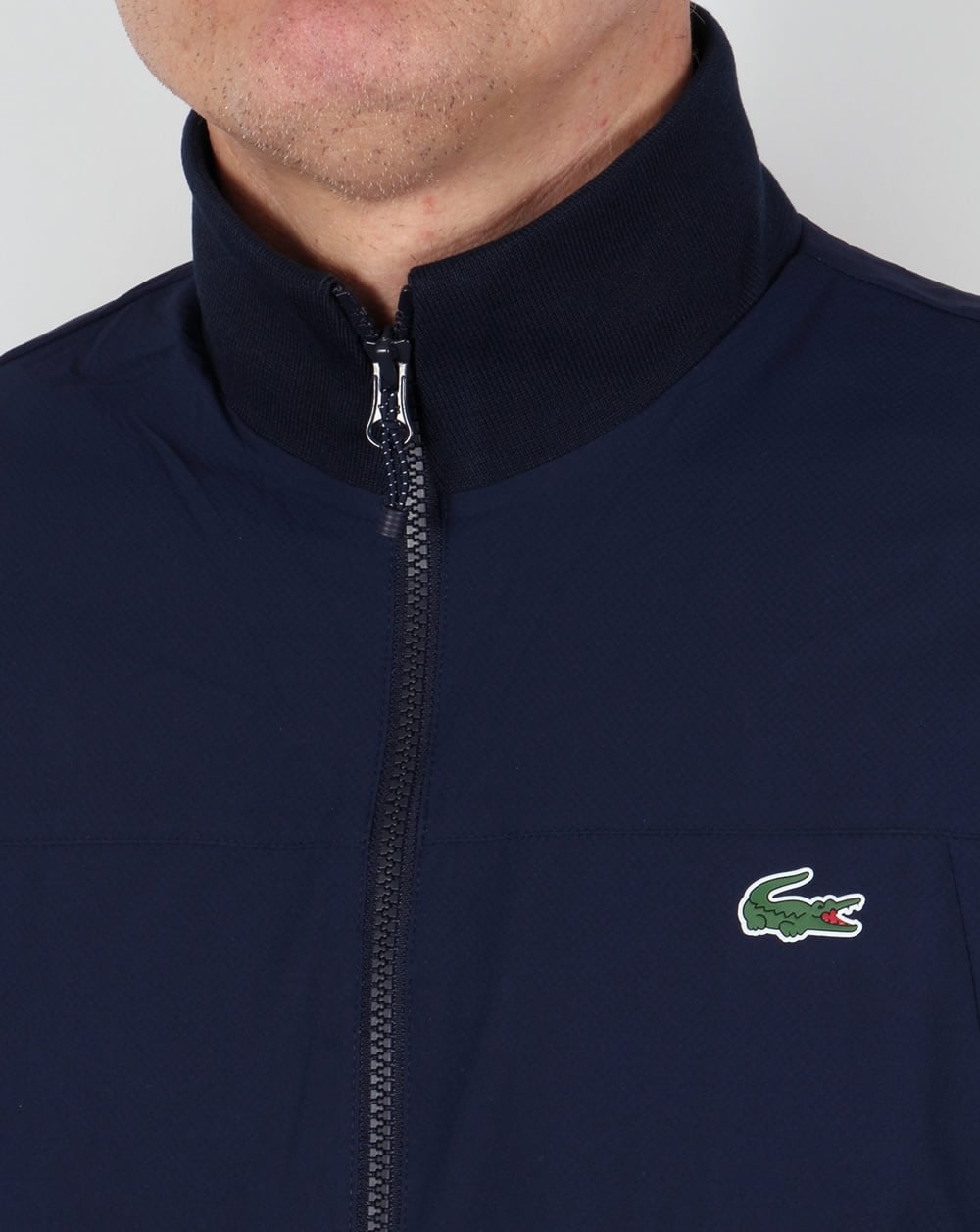 Lacoste – Reißverschlussjacke in Marineblau