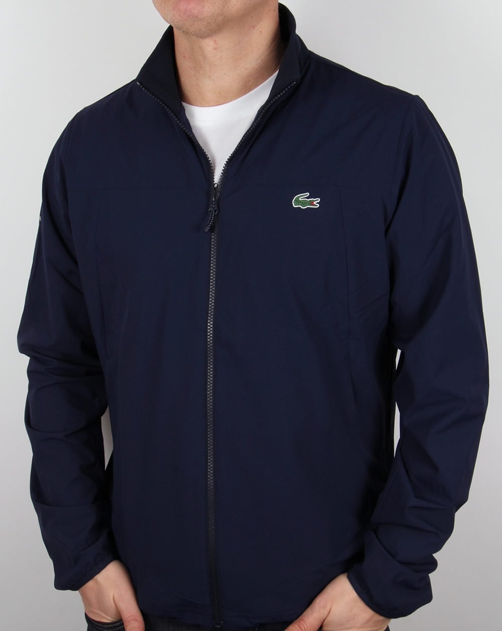 Lacoste – Reißverschlussjacke in Marineblau