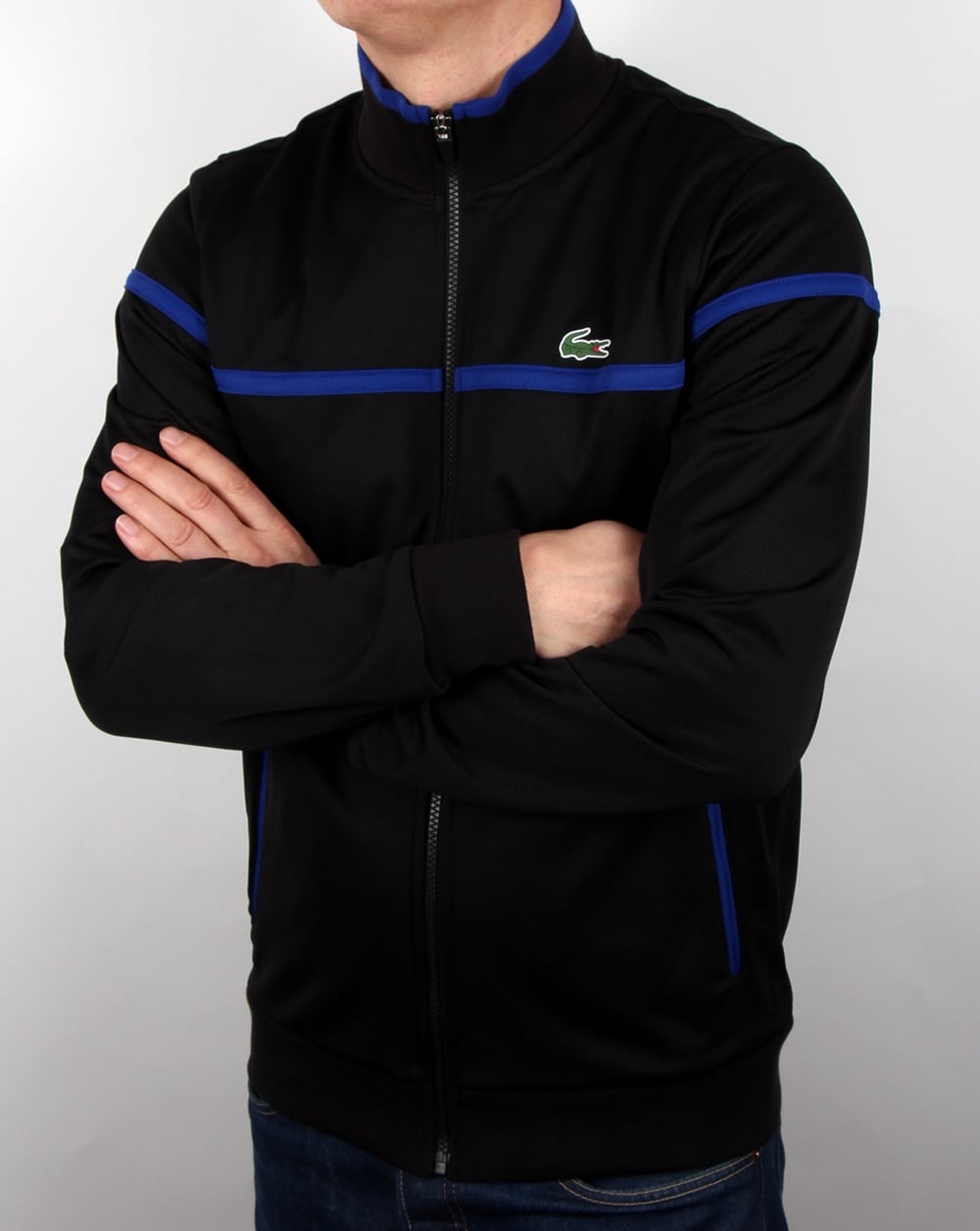Lacoste – Trainingsjacke mit feinen Streifen in Schwarz/Französischblau