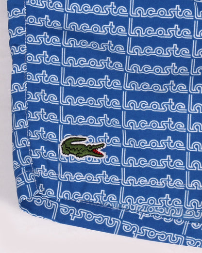 Lacoste – Badeshorts mit linearem Logo, Thermoblau