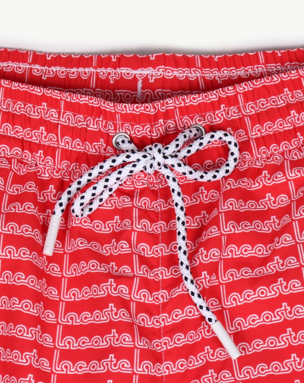 Lacoste – Badeshorts mit linearem Logo in Grenadine