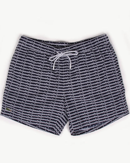 Lacoste – Badeshorts mit linearem Logo in Marineblau