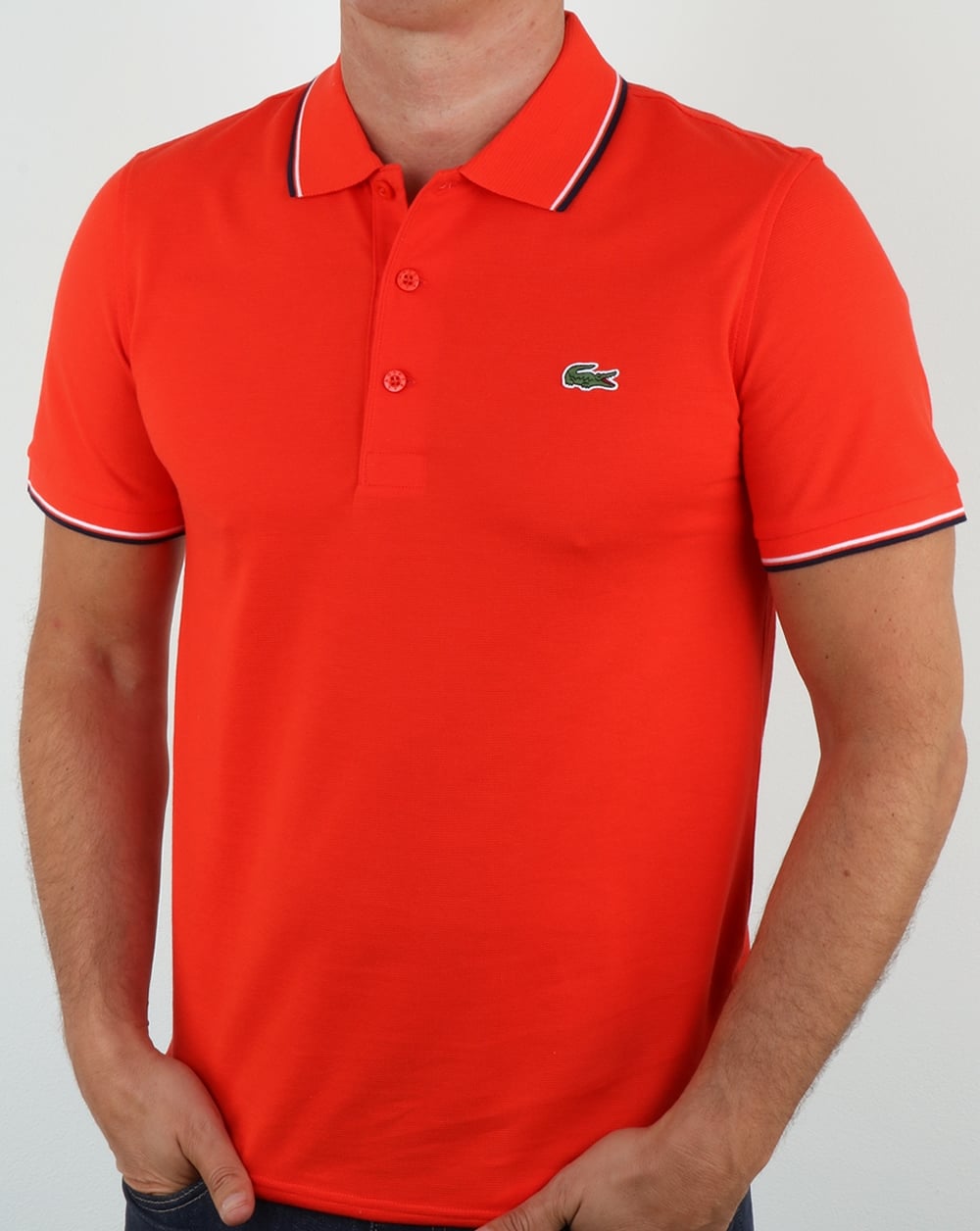 Lacoste Poloshirt mit Streifen Ätnarot/Marineblau