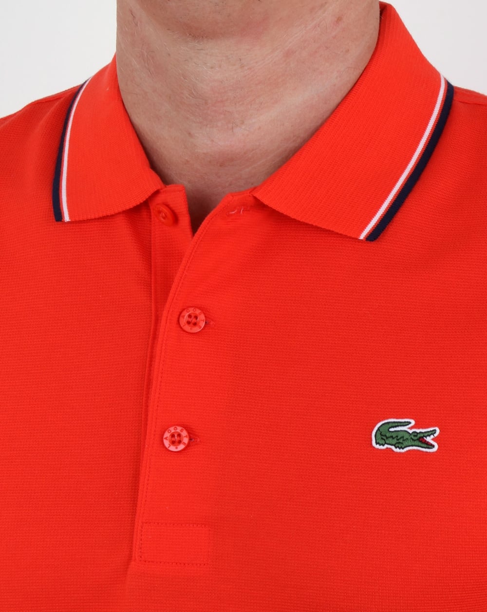 Lacoste Poloshirt mit Streifen Ätnarot/Marineblau