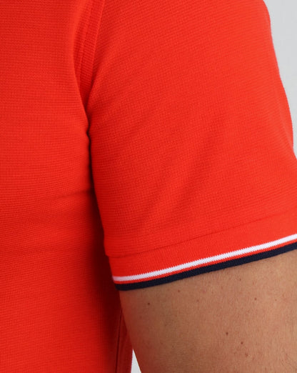 Lacoste Poloshirt mit Streifen Ätnarot/Marineblau
