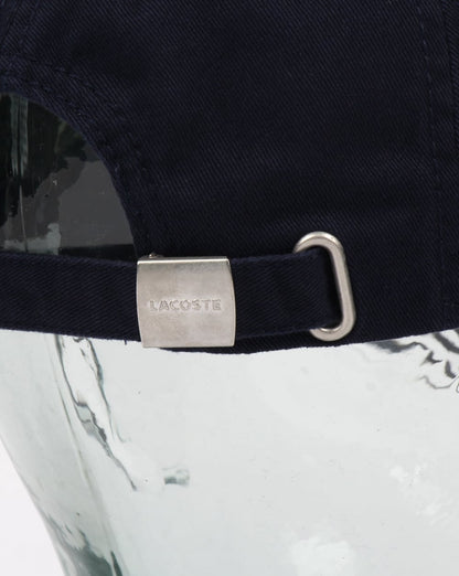 Lacoste – Übergroße Kroko-Kappe in Marineblau