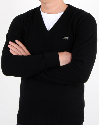 Lacoste – Wollpullover mit V-Ausschnitt in Schwarz