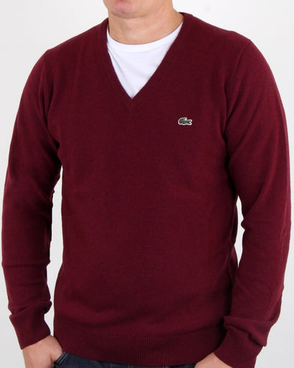 Lacoste – Wollpullover mit V-Ausschnitt in Burgunderrot
