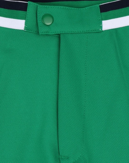 Ellesse – Grüne Shorts im Tennisstil mit Paspelierung