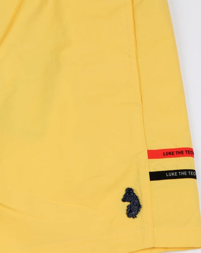 Luke Ragy Oberschenkellange Badeshorts Zitronengelb