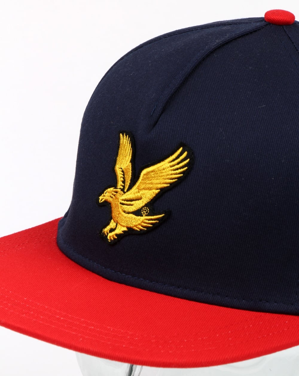 Lyle And Scott – Baseballkappe in Blockfarben, Dunkelmarineblau/Mohn