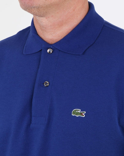 Lacoste – Klassisches Poloshirt mit zwei Knöpfen in Ozeanblau