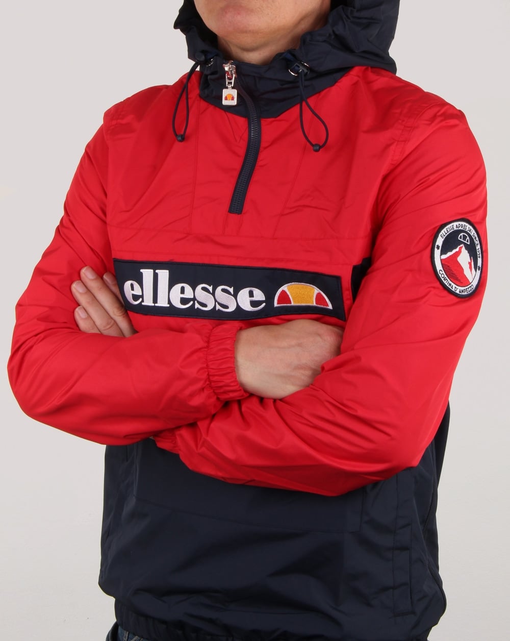 Ellesse – Überziehjacke mit Viertelreißverschluss, Marineblau/Rot