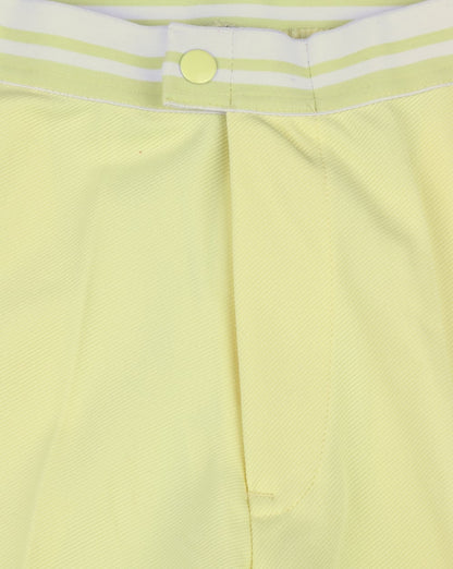 Ellesse – 80er-Tennisshorts in Zartgelb