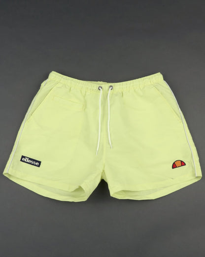 Ellesse – Beach-Badeshorts in Zartgelb