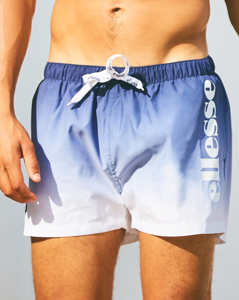 Ellesse – Fade – Badeshorts in Marineblau