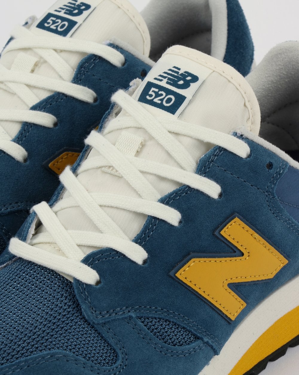 New Balance 520 Sneaker Dunkelblau/College-Gold
