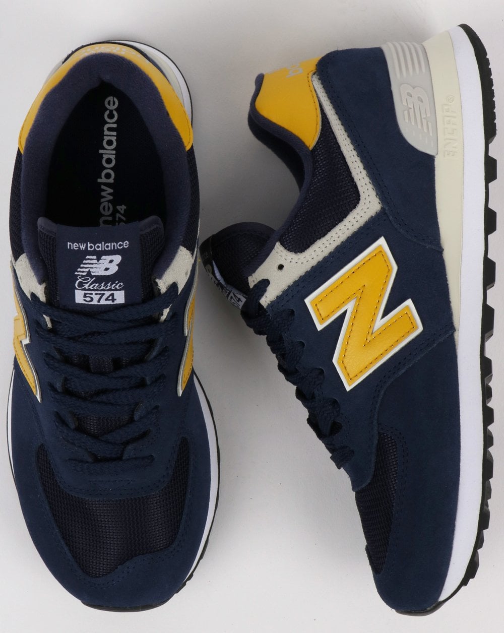 New Balance 574 Sneaker Marineblau/Gelb