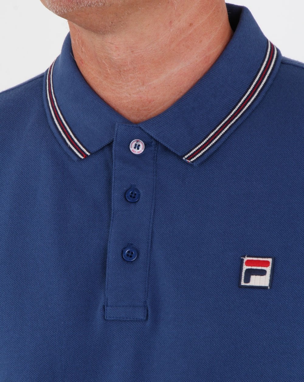 Fila – Poloshirt mit Vintage-Streifen in Mittelblau