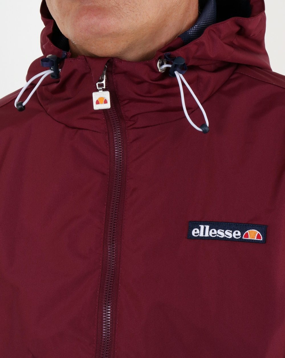 Ellesse – Beschichtete Shelljacke in Burgunderrot