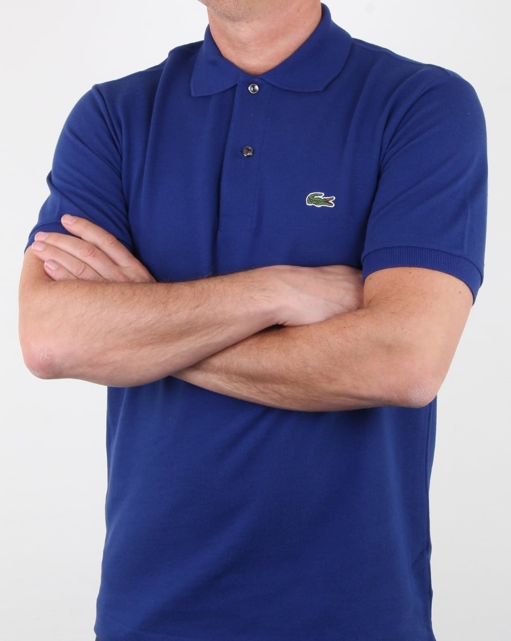 Lacoste – Klassisches Poloshirt mit zwei Knöpfen, Ozeanblau