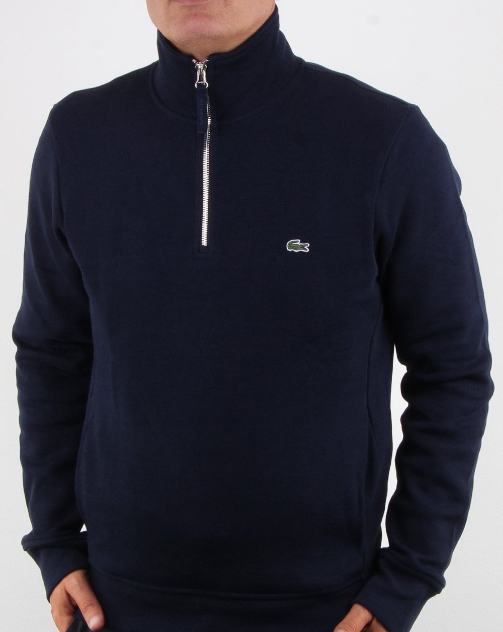 Lacoste – Oberteil mit Viertelreißverschluss in Marineblau