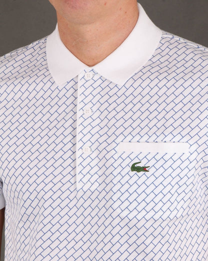 Lacoste – Poloshirt mit Kontrastkragen in Weiß und Marineblau