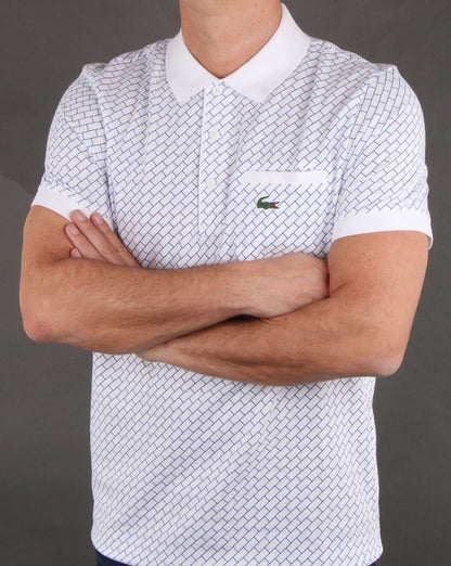 Lacoste – Poloshirt mit Kontrastkragen in Weiß und Marineblau