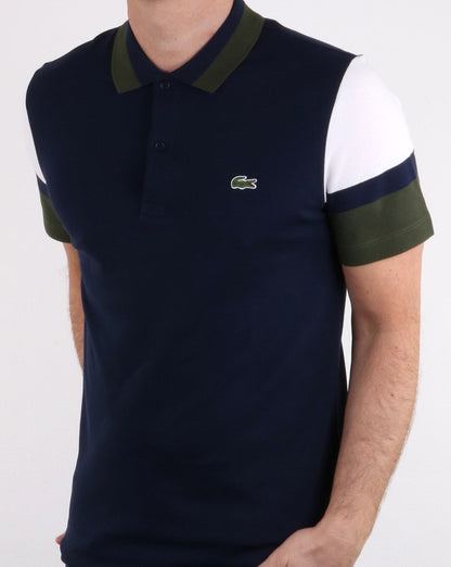 Lacoste Poloshirt mit farbigen Ärmeln in Marineblau, Weiß und Grün