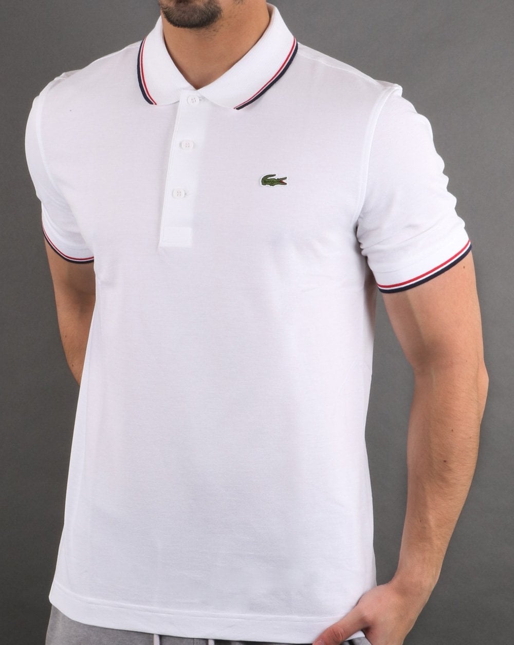 Lacoste Poloshirt mit Streifen Weiß/Marineblau/Rot