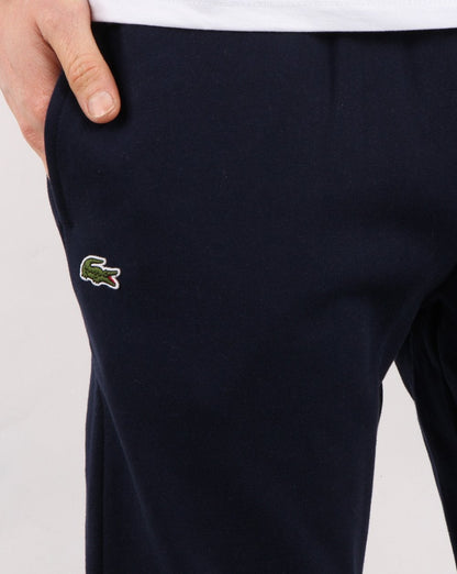 Lacoste – Schmale Trainingshose mit Bündchen in Marineblau