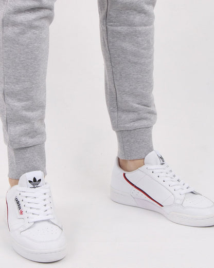 Lacoste – Schmale Trainingshose mit Bündchen in Grau