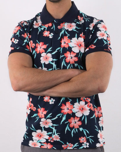 Gant – Piqué-Poloshirt mit durchgehendem Blumenmuster