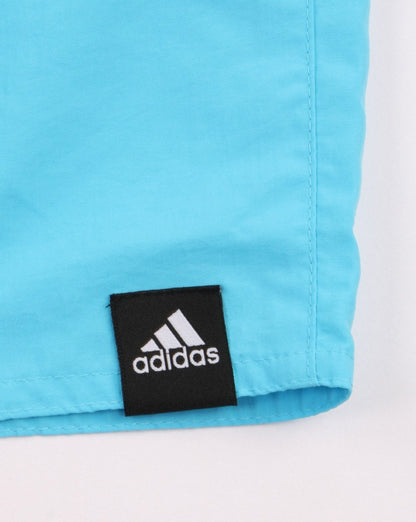 Adidas Originals – Solide Badeshorts in Hellcyan
