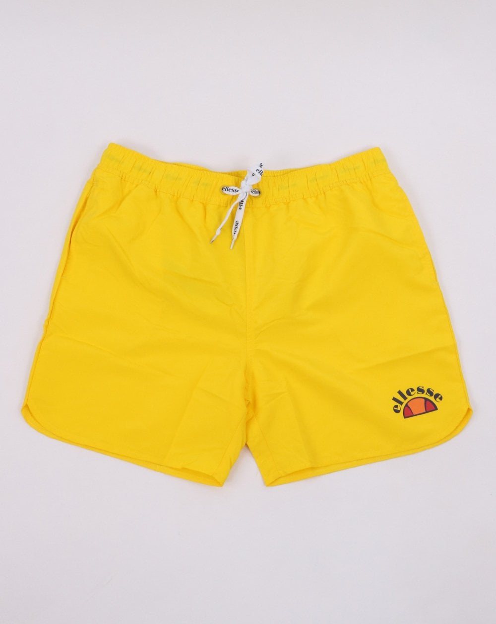 Ellesse – Nono – Badeshorts in Gelb