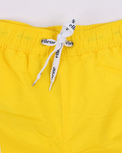 Ellesse – Nono – Badeshorts in Gelb
