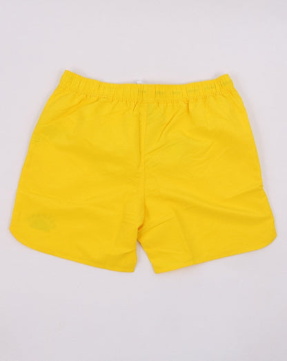 Ellesse – Nono – Badeshorts in Gelb