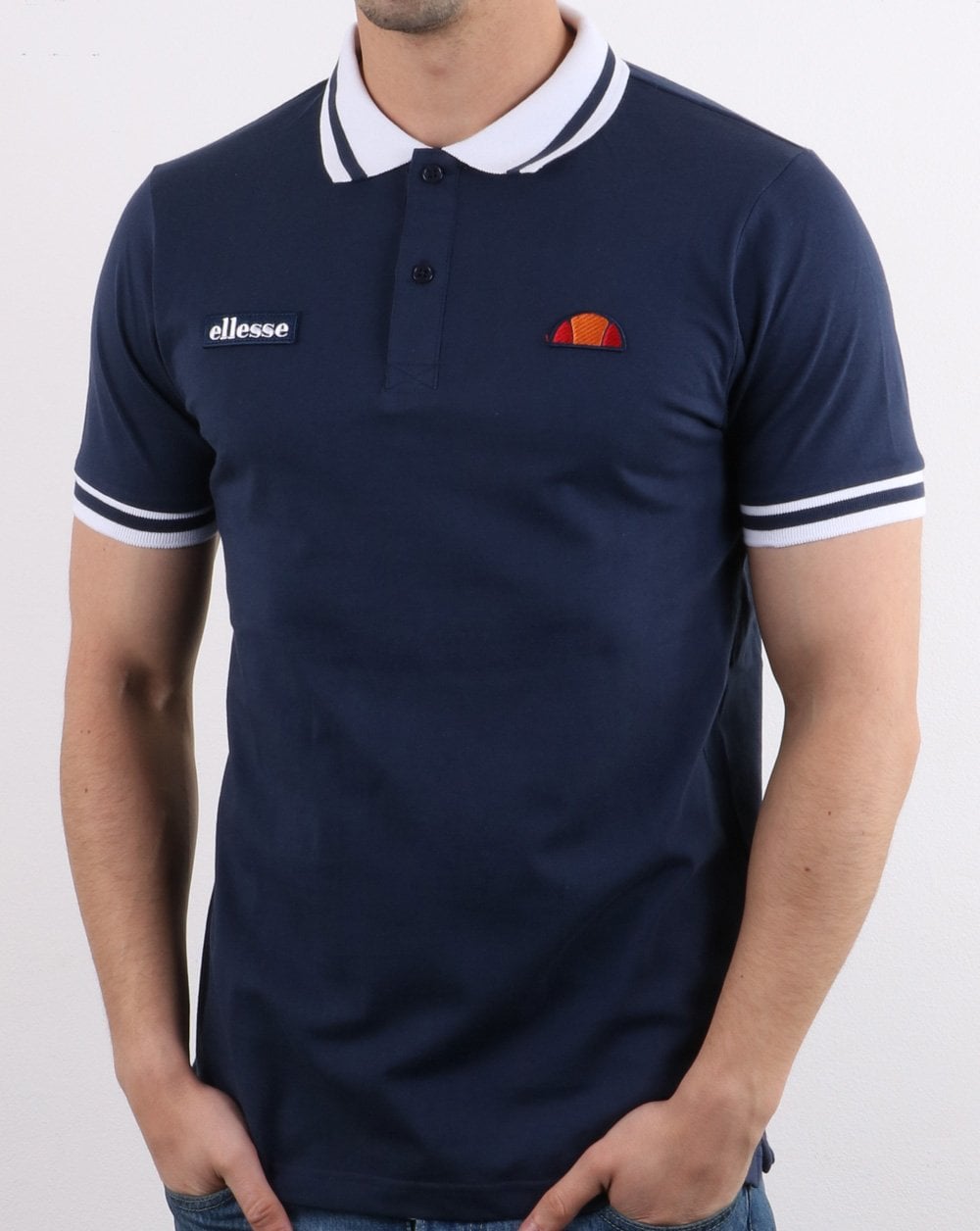 Ellesse – Poloshirt mit Streifen in Marineblau