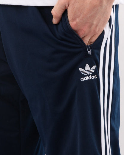 Adidas Originals – Firebird – Trainingshose in Marineblau