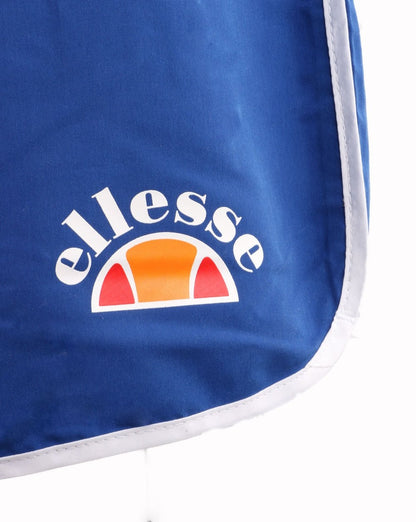 Ellesse – Badeshorts mit Paspelierung in Königsblau