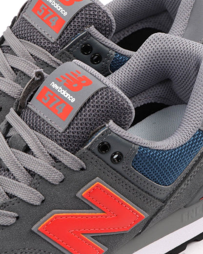 New Balance 574 Turnschuhe Grau/Orange