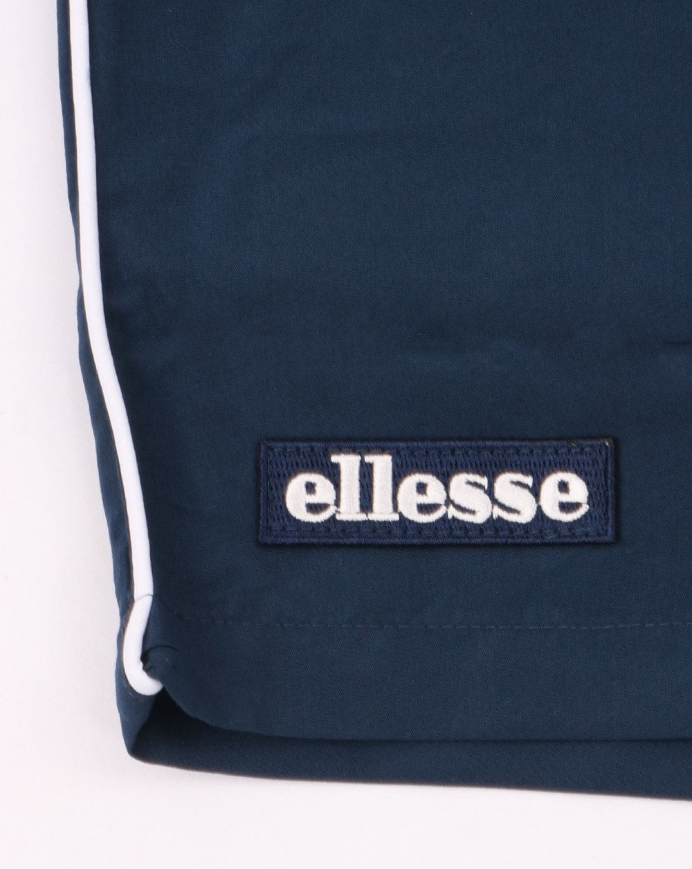 Ellesse – Badeshorts in Marineblau