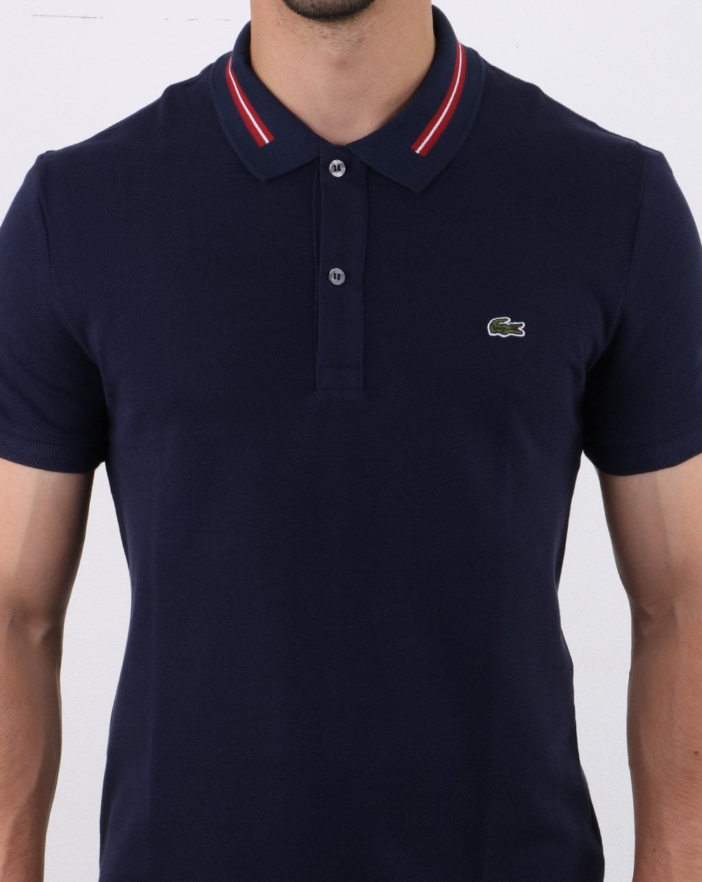 Lacoste – Poloshirt mit Stehkragen in Marineblau
